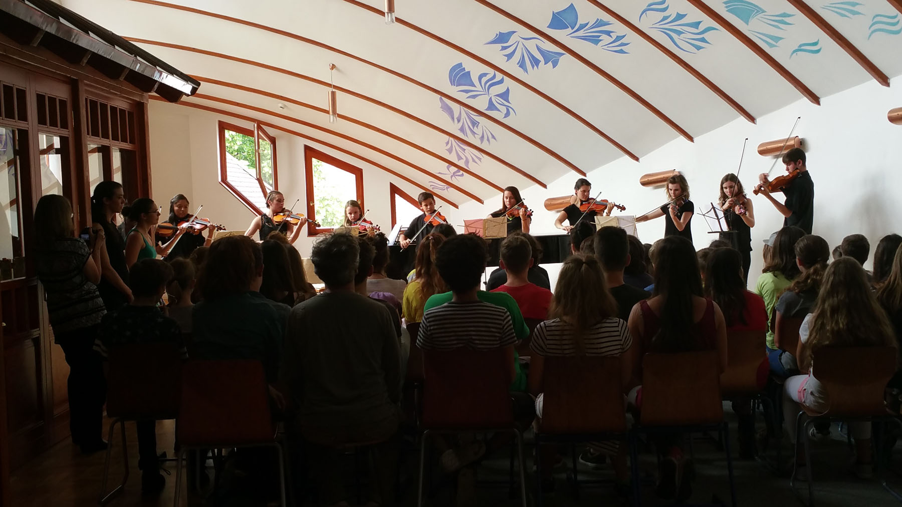 Tennille's Suzuki Violin School performing for the Murzzuschlag Suzuki Program